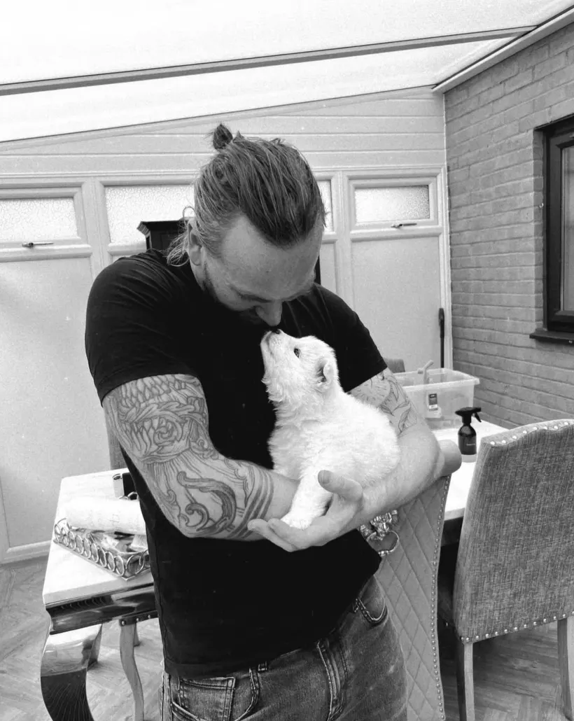 Michael holding a kitten