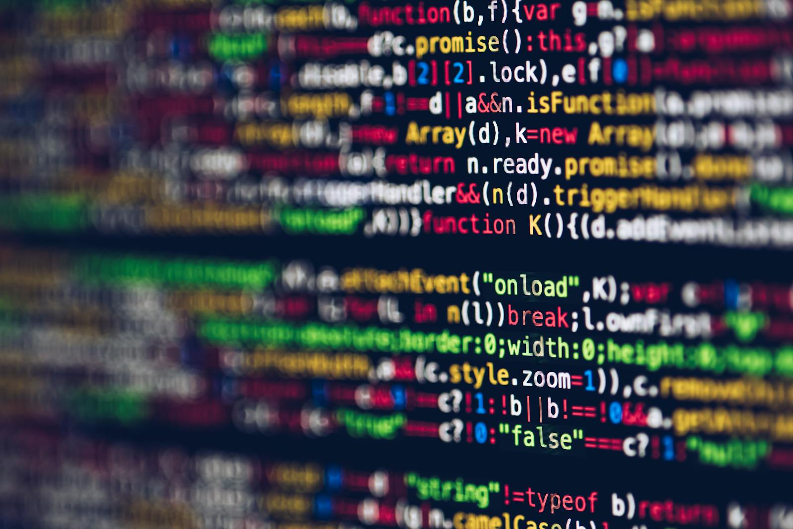 Close-up of a screen showing colourful JavaScript source code