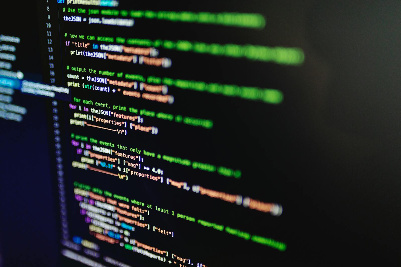 Dark screen showing Python source code highlighted in green, purple and orange