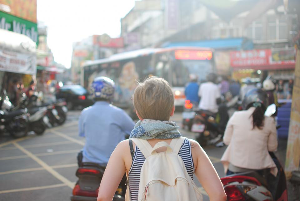A person carrying shopping bags