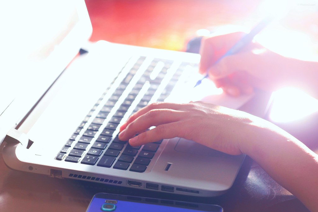 A laptop showing a website being edited