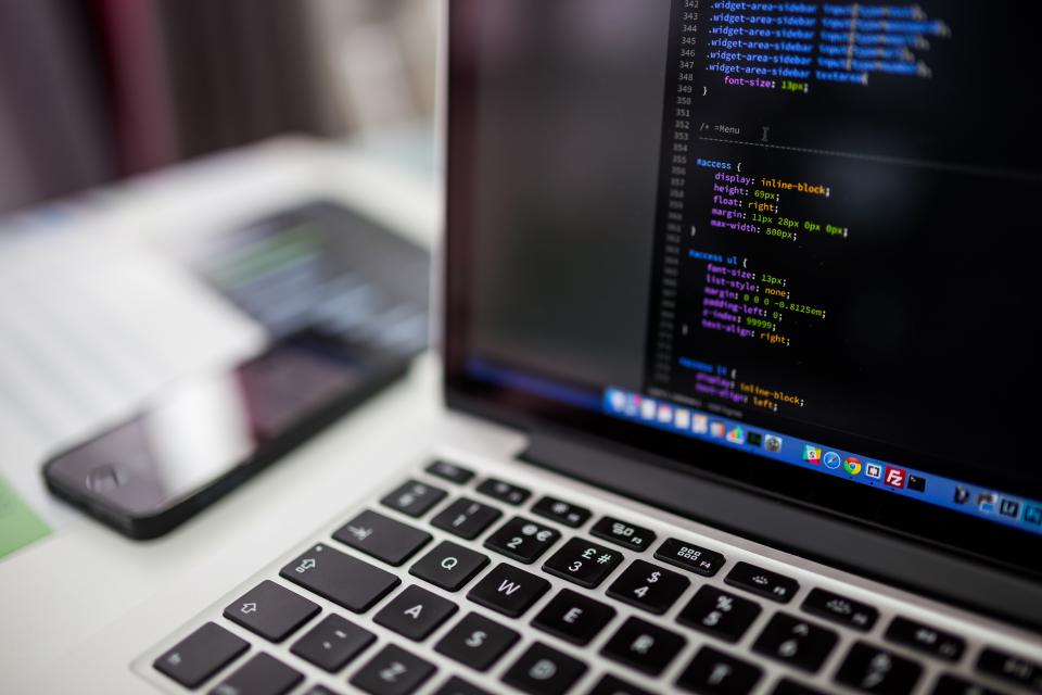 Code on a dark laptop screen