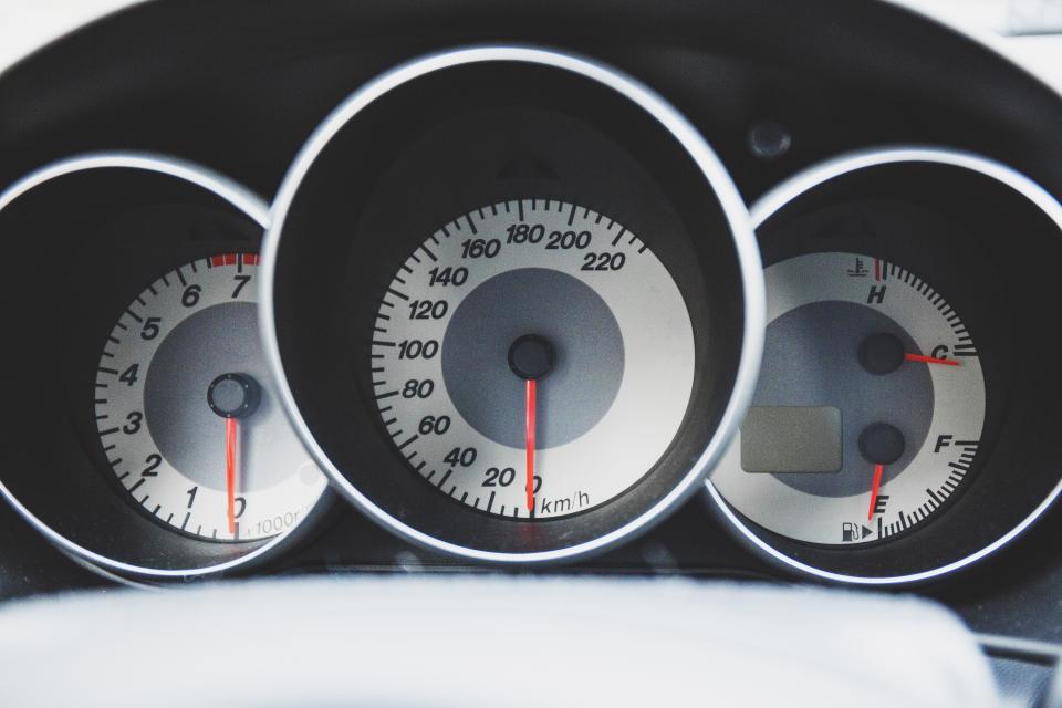 A car speedometer dashboard