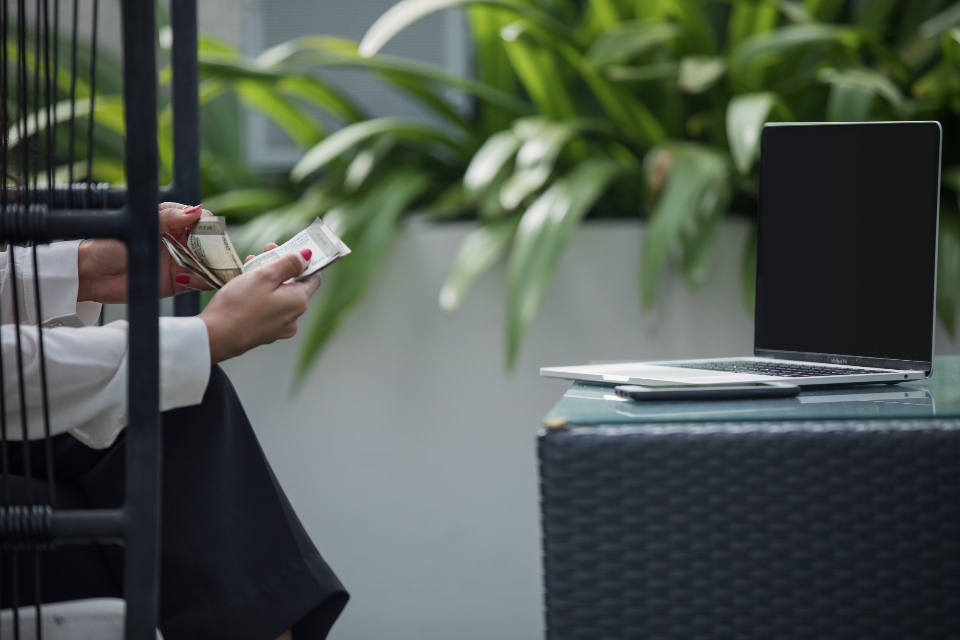 A businesswoman working on a laptop