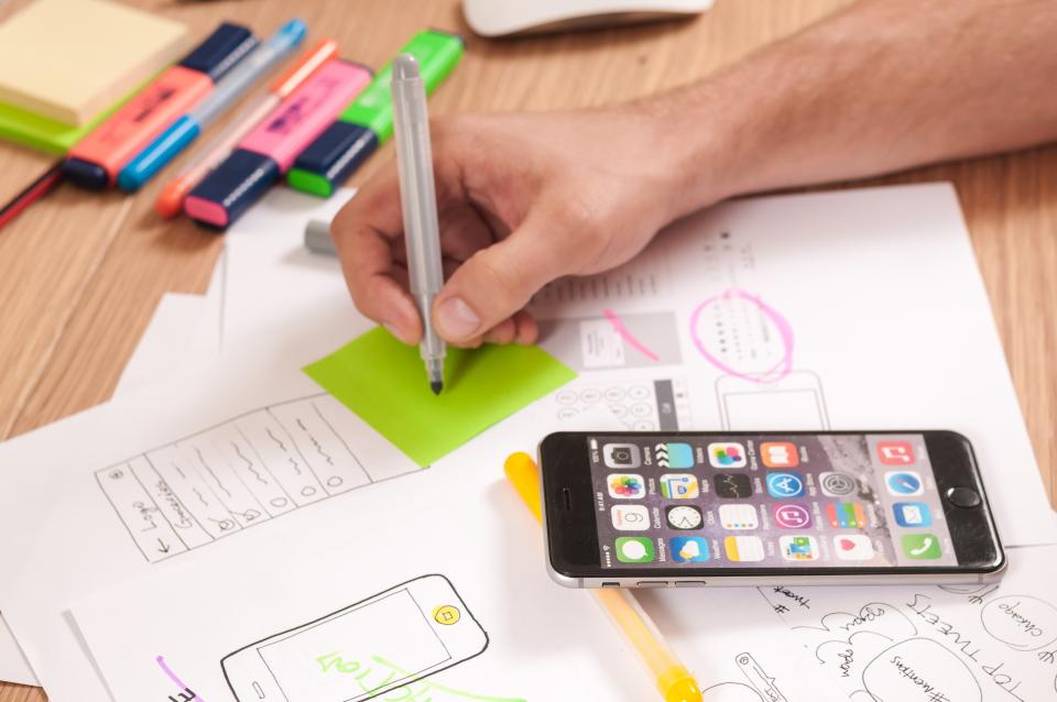 A phone mockup on a desk