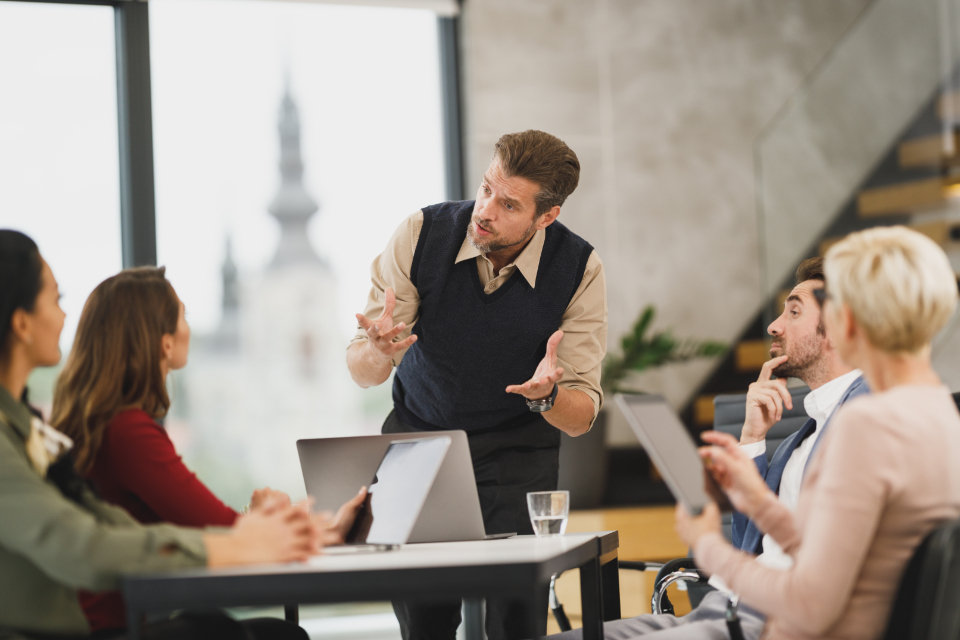 A presentation to a team in a meeting room