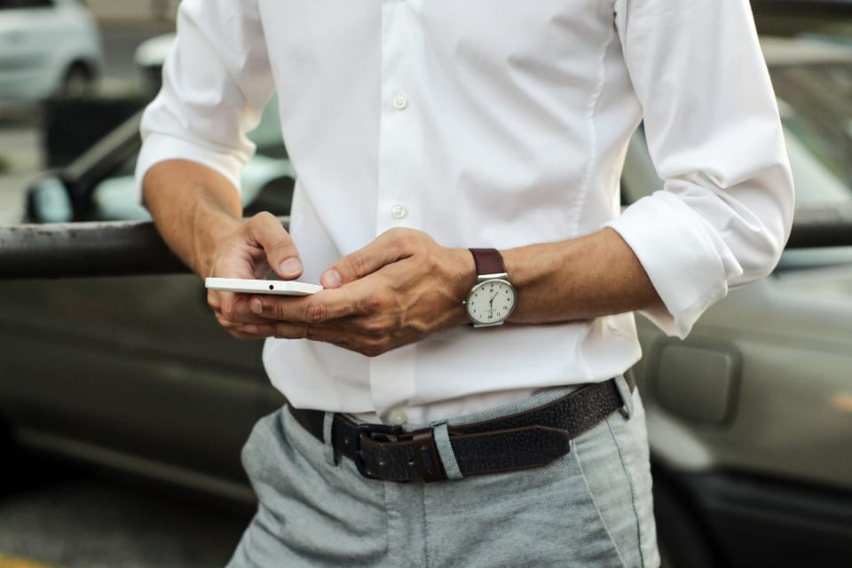 A person testing an app on a phone