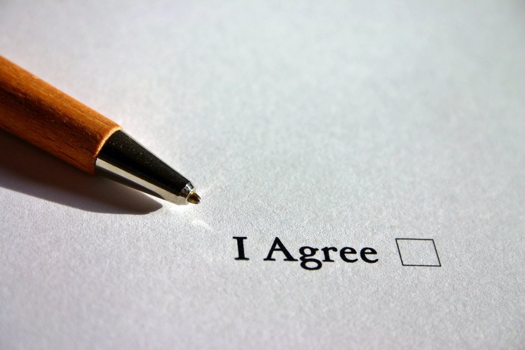 A pen resting on a printed form