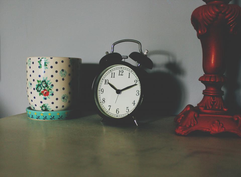 An alarm clock on a desk
