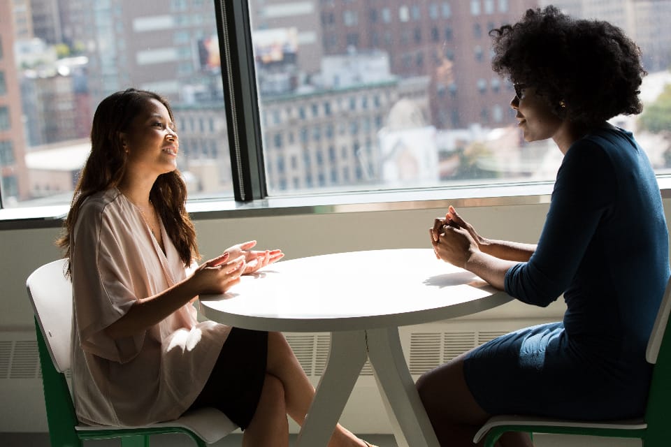 A team in discussion around a table