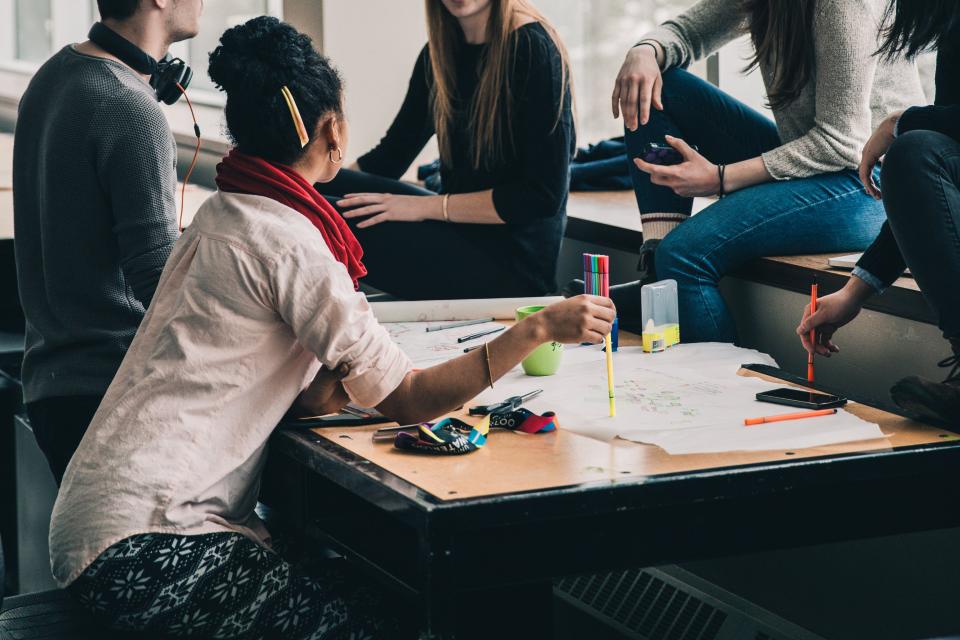 People in a workshop meeting